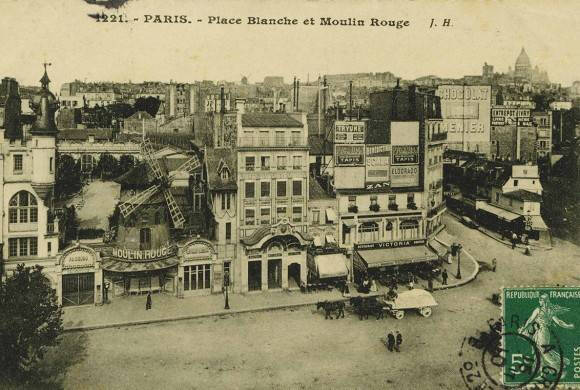 Black and white postcard of street view in Montmarte Paris in the 1890s.